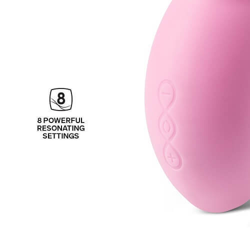 Pink massage ball with '8 Powerful Resonating Settings' text on a white background